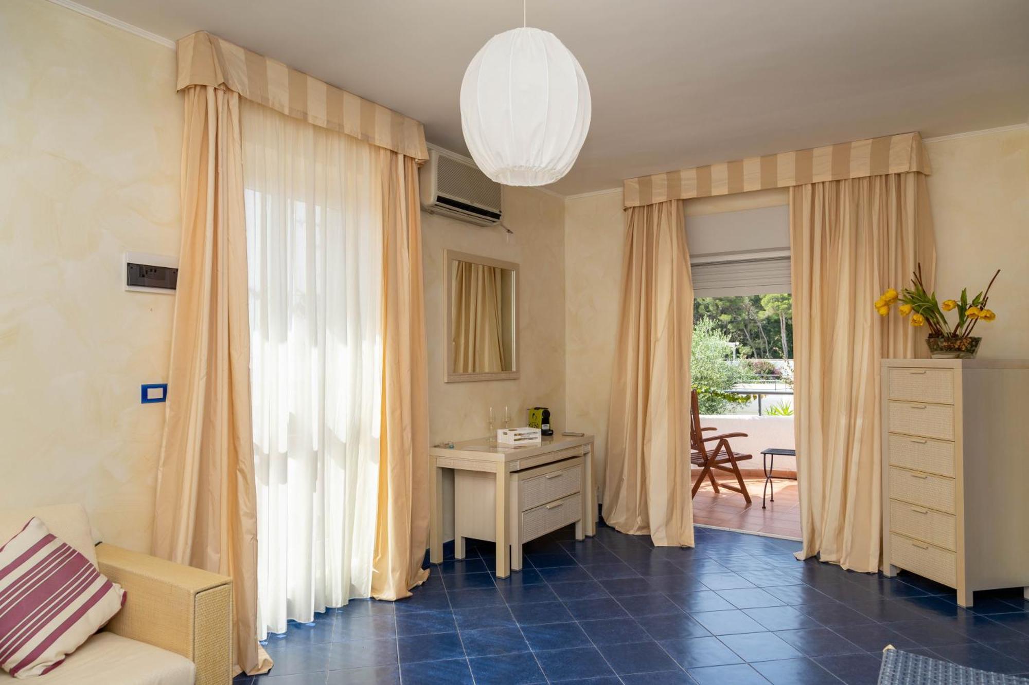 Hotel Ah Premium Baia Dei Faraglioni à Mattinata Extérieur photo